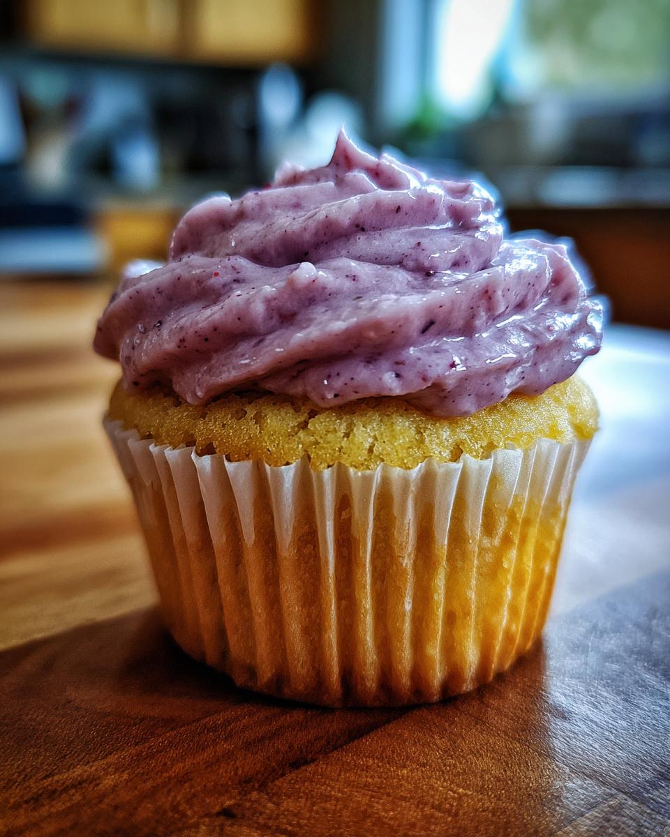 Delicious! 1 Recipe for Lemon Poppy Seed Cupcakes 4 Lemon Poppy Seed Cupcakes with Blackberry Frosting - detail 1